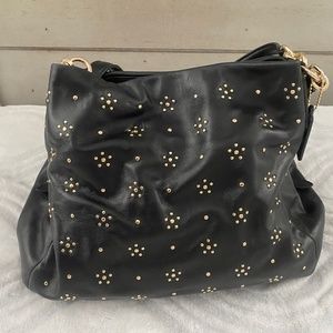 Black Leather Coach bag with gold accents